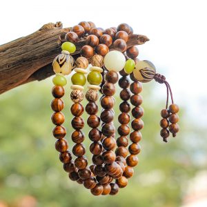 A 108 - bead rosewood fozhu string that brings health, rids of troubles, symbolizes wealth and good fortune, balances the body, mind and spirit, and conveys good wishes.